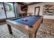 Game room with pool table and bar area at 555 S Park Ave # 202, Breckenridge, CO 80424