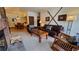 Living room with fireplace and access to dining area at 555 S Park Ave # 202, Breckenridge, CO 80424