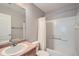 Well-lit bathroom features a tub/shower combination and vanity at 2538 Central Park Blvd, Denver, CO 80238