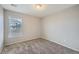 Small bedroom with plush carpet, neutral walls, and abundant natural light at 2538 Central Park Blvd, Denver, CO 80238