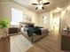 Serene primary bedroom with a large bed, neutral tones, and ample natural light at 4451 S Ammons St # 108, Littleton, CO 80123