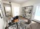 Bright and airy office space with a glass desk, stylish seating, and modern decor at 4451 S Ammons St # 108, Littleton, CO 80123