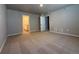 Well-lit bedroom with access to ensuite bathroom and walk-in closet at 48299 Shetland Dr, Bennett, CO 80102