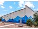 Commercial building featuring a modern exterior design and a beautiful mountain mural at 48299 Shetland Dr, Bennett, CO 80102
