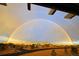 Beautiful view of a neighborhood with a double rainbow after the rain, creating a bright and cheerful scene at 5118 Bottlebrush Run, Broomfield, CO 80023