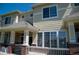 Charming townhome featuring a cozy front porch, perfect for relaxing and enjoying the neighborhood views at 16180 E Geddes Ln # 14, Aurora, CO 80016