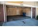 A large two-car garage with lots of shelving and organization, providing convenience and functionality at 16180 E Geddes Ln # 14, Aurora, CO 80016
