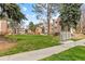 Green space near the apartments with manicured lawn and mailboxes at 6455 E Bates Ave # 3-102, Denver, CO 80222