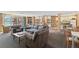 Comfortable lounge area with plush seating, a kitchenette, and a view at 6455 E Bates Ave # 3-102, Denver, CO 80222