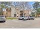 Apartment parking lot with multiple parking spaces for residents and guests at 6455 E Bates Ave # 3-102, Denver, CO 80222