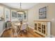 Cozy breakfast nook featuring bright light with hardwood floors at 1290 S Milwaukee St, Denver, CO 80210