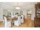 Dining room with hardwood floors shows the spacious floorplan with adjacent living and kitchen areas at 1290 S Milwaukee St, Denver, CO 80210