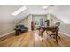 Inviting home office offers hardwood floors, natural light, and a vintage desk, creating a productive workspace at 1290 S Milwaukee St, Denver, CO 80210