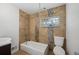 Modern bathroom showcases decorative tile and fixtures, with a shower and toilet at 7550 Raleigh St, Westminster, CO 80030
