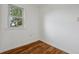 Small bedroom with window and hardwood floors at 7550 Raleigh St, Westminster, CO 80030