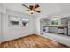Open dining room showcasing hardwood floors and open concept to the kitchen at 7550 Raleigh St, Westminster, CO 80030