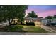 Charming single-Gathering home with a well-maintained lawn, mature trees and an attached garage during sunset at 7550 Raleigh St, Westminster, CO 80030