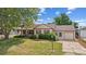 Charming single-Gathering home with a well-maintained lawn, mature trees and an attached garage at 7550 Raleigh St, Westminster, CO 80030