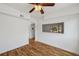 Inviting living room with hardwood floors and a large opening to view the adjacent room at 7550 Raleigh St, Westminster, CO 80030