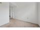 Empty room with white walls and carpeted flooring at 7550 Raleigh St, Westminster, CO 80030
