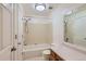 Clean bathroom featuring a combined shower and tub, complemented by a functional vanity at 6755 S Field St # 606, Littleton, CO 80128