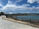 Scenic walking path along the community lake and beautiful mountain views at 3010 Zinnia Ct, Golden, CO 80401