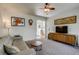Inviting living room featuring a comfortable seating area and entertainment center at 3010 Zinnia Ct, Golden, CO 80401