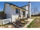 Backyard featuring a patio with outdoor seating, grill, and well-maintained lawn at 690 Howe Ct, Castle Rock, CO 80104