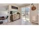 Dining area with sliding glass door to backyard, wood cabinet and a view of the lower level at 690 Howe Ct, Castle Rock, CO 80104