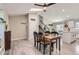 Dining room that opens to the kitchen and stairs for easy access throughout the home at 690 Howe Ct, Castle Rock, CO 80104