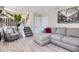 Comfortable living room with a sectional sofa, recliner and stairway to the second floor at 690 Howe Ct, Castle Rock, CO 80104