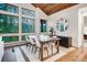 Bright dining room features a wood table and chairs, with scenic views at 699 Highlands Dr, Breckenridge, CO 80424