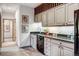 Wet bar with granite countertops and wine storage at 699 Highlands Dr, Breckenridge, CO 80424