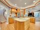 Open kitchen layout with large island and breakfast bar at 291 Fairchild Dr, Highlands Ranch, CO 80126