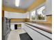 Bright laundry room with ample counter space and storage at 291 Fairchild Dr, Highlands Ranch, CO 80126
