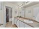 Bright bathroom offers a large vanity and plenty of storage at 3762 White Rose Loop, Castle Rock, CO 80108