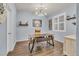Stylish home office featuring hardwood floors, modern lighting, and a sleek desk with industrial-chic accents at 3762 White Rose Loop, Castle Rock, CO 80108