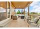 Inviting porch with comfortable seating area, perfect for relaxing and enjoying the outdoors at 3762 White Rose Loop, Castle Rock, CO 80108