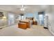 Spacious main bedroom with a king bed, natural light, and access to a private balcony at 6943 Saddleback Ave, Firestone, CO 80504