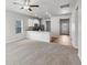 Bright and airy living space with access to a modern kitchen at 2214 Alyssa St, Fort Lupton, CO 80621