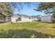 Spacious backyard features a patio, shed, barbecue grill, and grass area at 2066 E 129Th Ave, Thornton, CO 80241