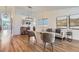 Bright living room with hardwood floors, modern lighting, and neutral decor for a cozy feel at 2066 E 129Th Ave, Thornton, CO 80241