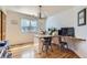 Well-lit home office with custom built-in desk and shiplap accent wall at 2066 E 129Th Ave, Thornton, CO 80241