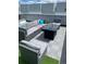 Rooftop deck with sectional sofa and fire pit at 3101 W 47Th Ave # 17, Denver, CO 80211