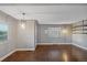 Spacious living room with hardwood floors and neutral walls at 3608 N Grape St, Denver, CO 80207