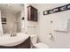 Modern bathroom featuring a sleek vanity, tile shower, and decorative wall art at 3260 47Th St # 201A, Boulder, CO 80301