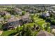 Well-maintained backyard with lush lawn and mature trees in a Gathering-friendly neighborhood with a community park nearby at 22268 E Hidden Trail Dr, Parker, CO 80138