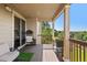 Stylish outdoor deck with a hanging chair and flower box, offering a peaceful retreat at 22268 E Hidden Trail Dr, Parker, CO 80138