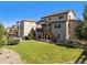 Spacious backyard with a well-maintained lawn and deck, with easy access to the above yard at 22268 E Hidden Trail Dr, Parker, CO 80138