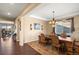 Inviting dining room featuring a decorative chandelier and area rug at 22268 E Hidden Trail Dr, Parker, CO 80138
